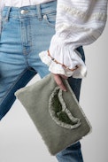 Uma Clutch - Women's khaki cotton clutch bag with fringing, wing patch and a beaded strap