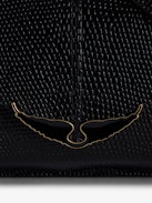Borderline Embossed Clutch - Women’s black iguana-embossed leather clutch with shoulder strap with wings charm.
