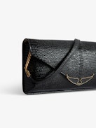Borderline Embossed Clutch - Women’s black iguana-embossed leather clutch with shoulder strap with wings charm.
