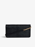 Borderline Embossed Clutch - Women’s black iguana-embossed leather clutch with shoulder strap with wings charm.