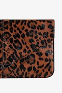 Borderline Leopard Pouch - Women’s brown leopard-print patent leather envelope clutch with wings charm.