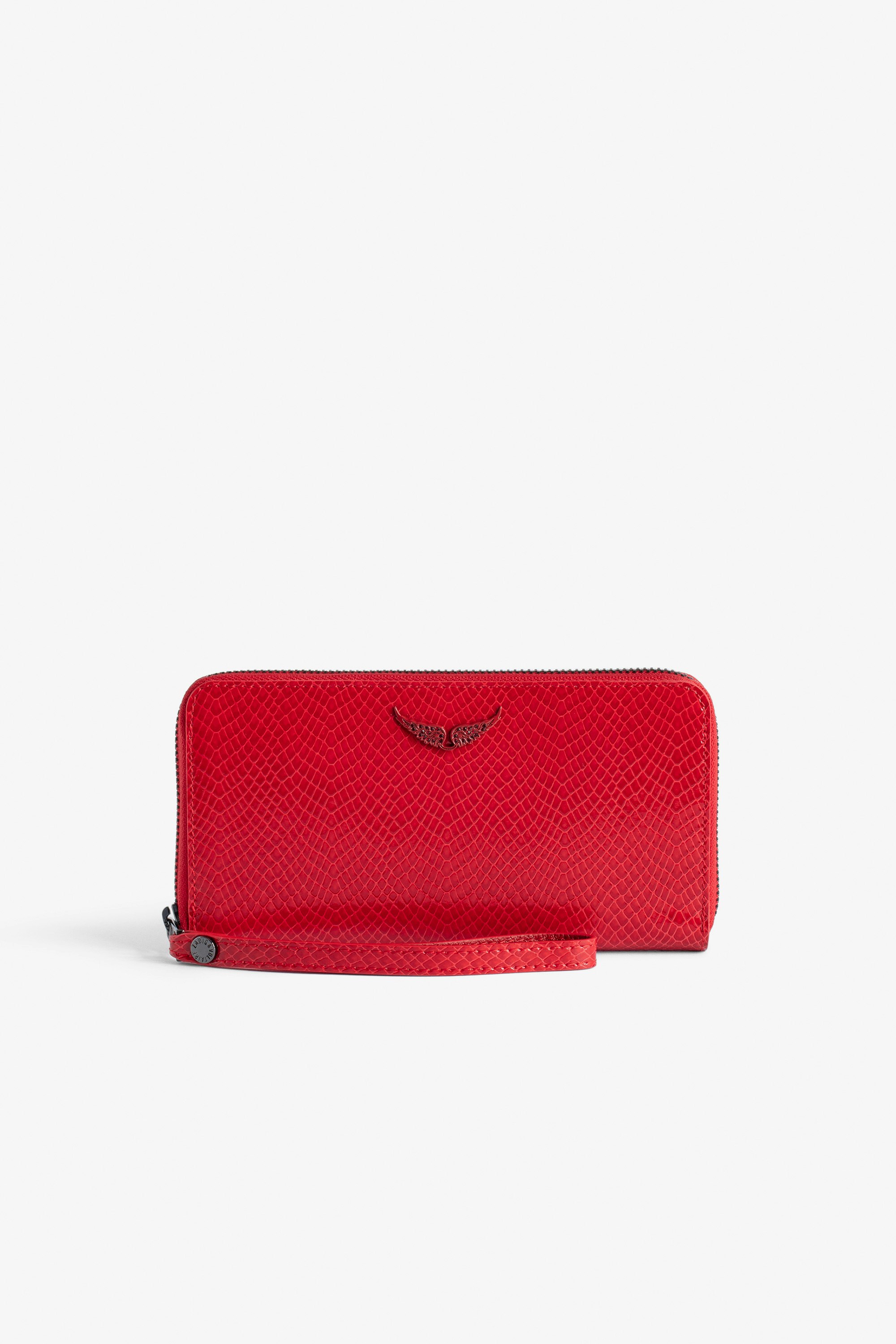 Brieftasche Compagnon Glossy Wild Geprägt - Brieftasche aus glänzendem Leder in Rot mit Phyton-Effekt und Flügel-Charm für Damen.