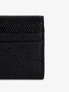 Portefeuille Borderline Embossé - Petit portefeuille en cuir embossé effet iguane noir à rabat.