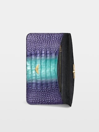 Borderline Embossed Metallic Clutch - Clutch in croc-effect embossed metallic leather with a lacquered wings clasp.