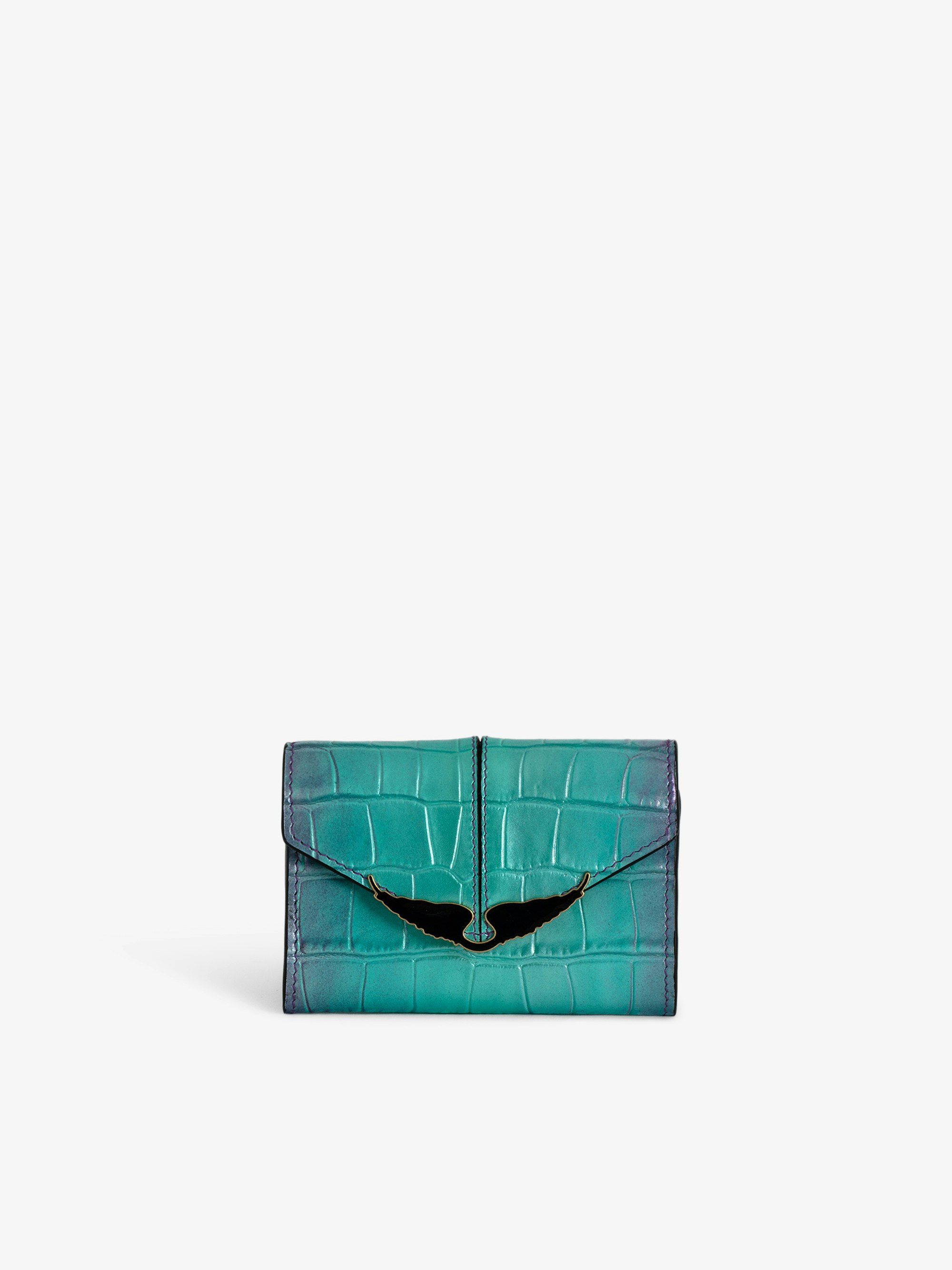 Brieftasche Borderline Geprägt - Kleine Brieftasche aus Metallic-Leder mit Kroko-Prägung in Violett mit Klappe und Flügeln.