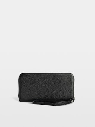 Compagnon Wallet - Grained leather wallet adorned with a wing charm.