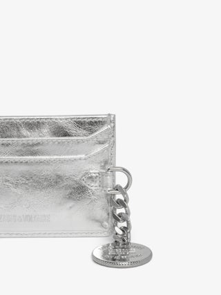 Sunny Pass Vintage Metal Card Holder - Metallic leather card holder with medallion charm and wing signatures.