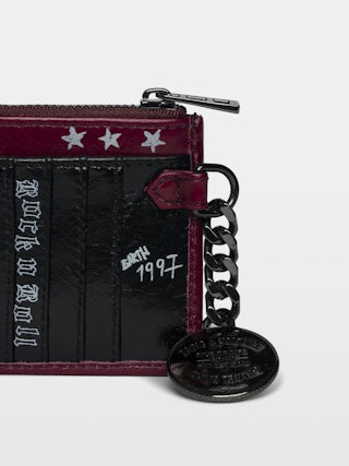 Sunny Card Punk Kartenhalter - Kartenhalter aus Lackleder mit Vintage-inspiriertem Effekt, Medaillon und Flügel-Signaturen.