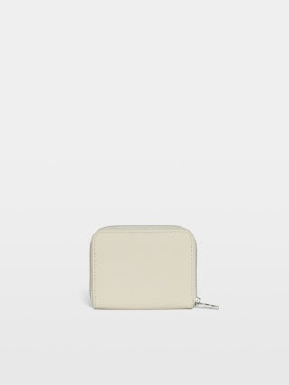 Porte-Monnaie Mini ZV America - Portefeuille en cuir grainé orné d'ailes à strass signatures.