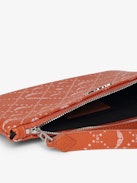 Z Pouch Monogram Clutch - Monogram canvas Clutch with signature wings.