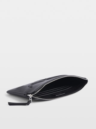 Clutch Angel - Grained leather clutch with embossed wings signature.