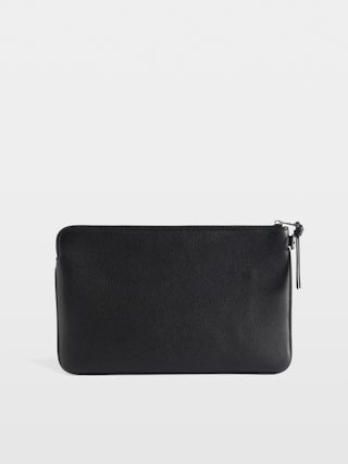 Clutch Angel - Grained leather clutch with embossed wings signature.