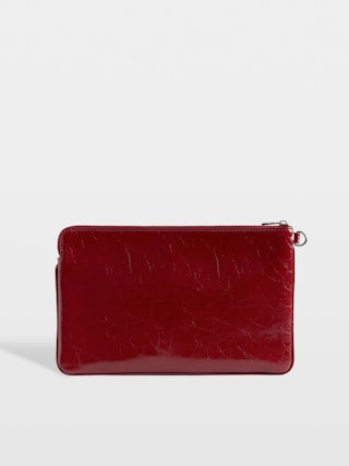 Angel Pouch - Pouch in patent leather adorned with embossed wings signature.