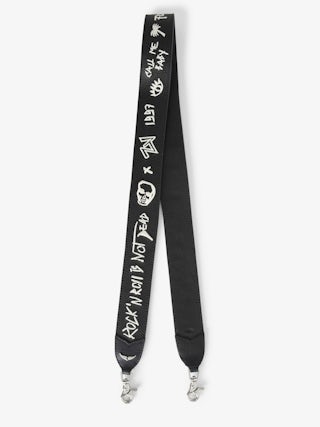 Shoulder Strap - Adjustable shoulder strap in grained leather with wing signature tag.