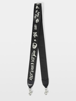 Bandoulière - Bandoulière ajustable en cuir grainé tagué avec signature ailes.