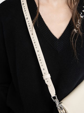 Overstudded Shoulder Strap - Adjustable thin shoulder strap in grained leather adorned with studs.