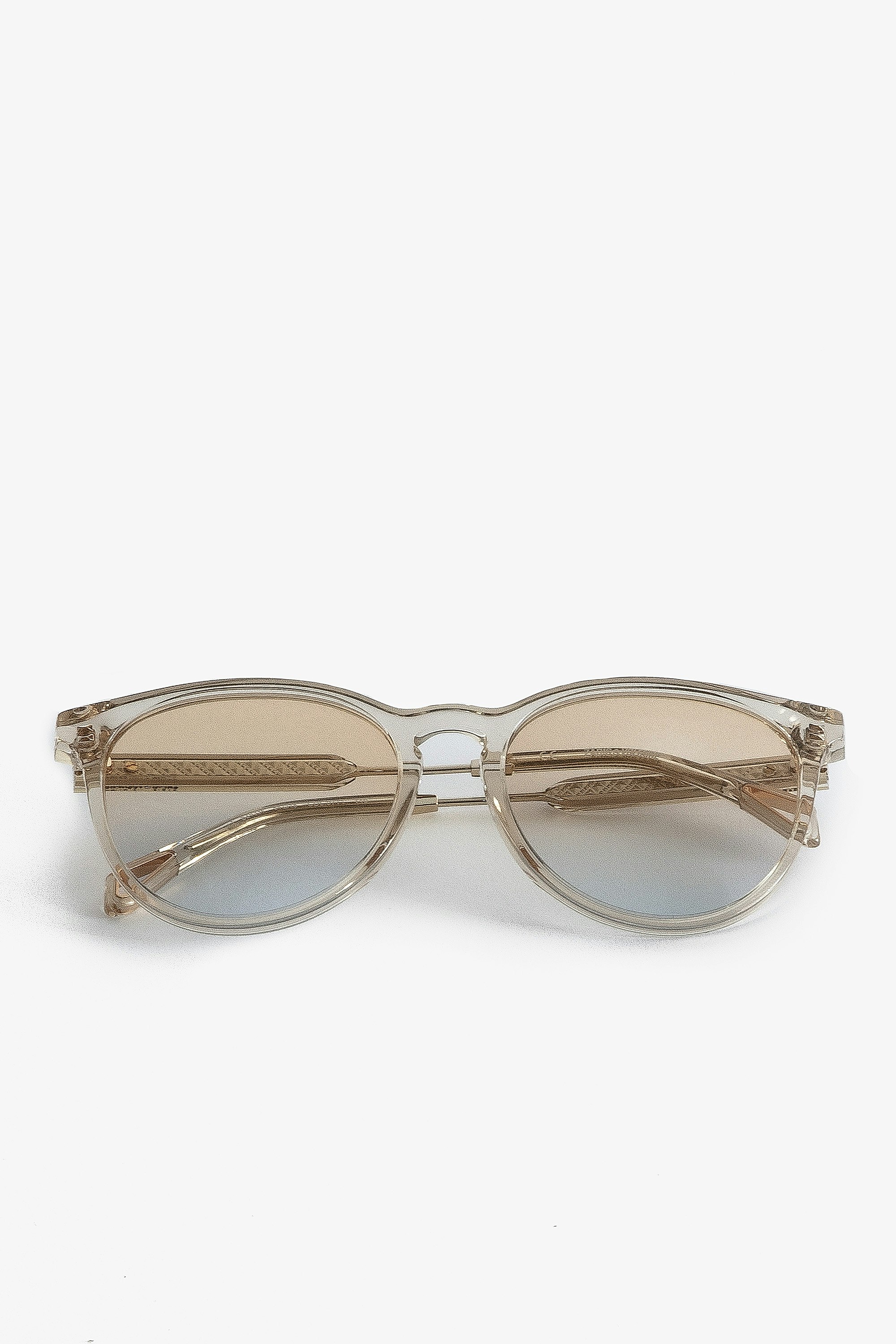 Wire Metal Sunglasses - Clear beige sunglasses with half wire frame.