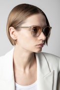 Wire Metal Sunglasses - Clear beige sunglasses with half wire frame.