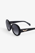 Iconic Wings Sunglasses - Unisex round-lens sunglasses in black metal with smoke glass