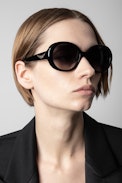 Iconic Wings Sunglasses - Unisex round-lens sunglasses in black metal with smoke glass