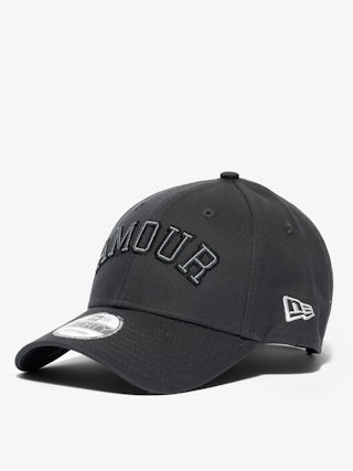 New Era x ZV Amour Cap - Dark grey cotton baseball cap with “Amour” embroidery and New Era logo on the front and “Unlimited Love” slogan on the back.