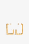 Cecilia Earrings - Large C-shaped earrings in hammered gold-tone brass.
