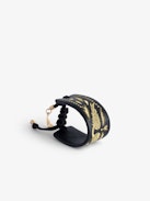 Pulsera Lenny - Brazalete negro de cuero anudable con alas doradas.