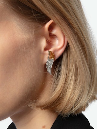 Rock Over Earrings - Gold-tone brass earrings with wings embellished with silver crystals.
