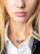 Rock Feather Necklace - Gold-tone and blackened brass necklace with a wing pendant embellished with crystals.