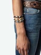 Wings Bracelet - Gold-tone brass bracelet in the shape of wings.