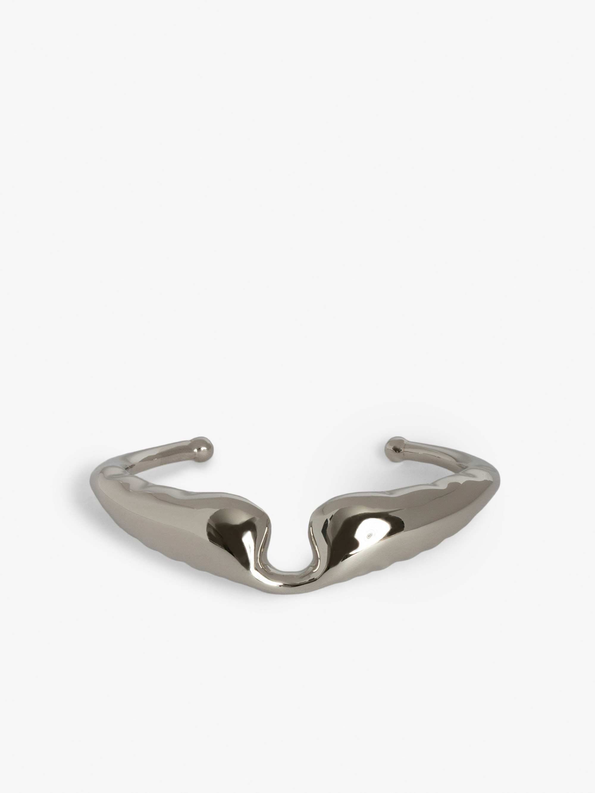 Wings Bracelet - Silver-tone brass bracelet in the shape of wings.