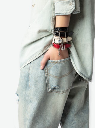 Sunny Leather Bracelet - Vintage-effect patent leather bracelet with a medallion charm.