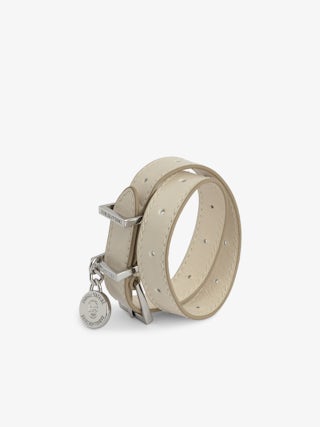 Sunny Leather Bracelet - Double-wrap bracelet in ecru patent leather with vintage effect featuring medallion charm and belt buckle.