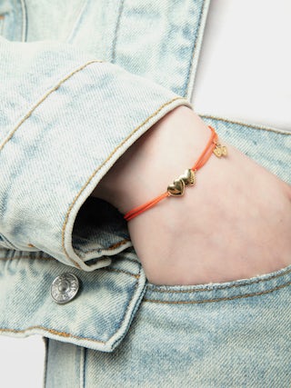 Zadig Link Heart Bracelet - Adjustable cord bracelet with iconic double engraved hearts from the house.