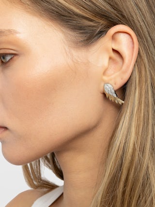 Rock Feather Strass Earrings - Asymmetrical wing earrings in gold-plated and blackened brass set with white crystals.