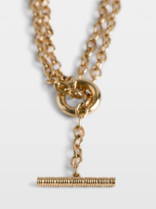 Necklace Heartbreaker - Gold-tone brass long necklace with heart pendant.