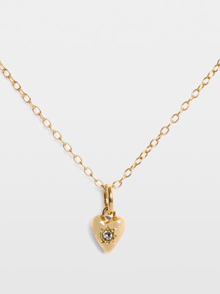 Halskette Heartbreaker - Lange Kette aus goldfarbenem Messing mit Herzanhänger.