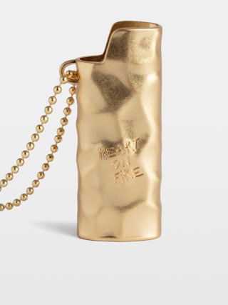 Heart On Fire Lighter Case - Voltaire Vice golden metal lighter case with removable chain, message and signature.