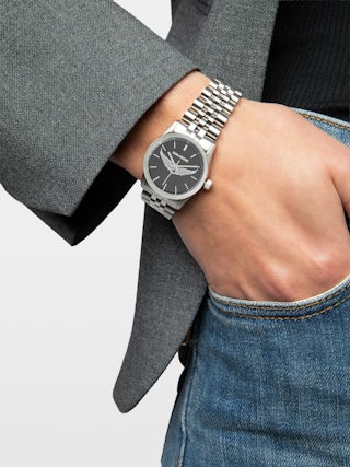 Zadig Small Watch - Stainless steel watch with black dial with silver wings and steel bracelet.