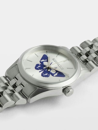Zadig Small Watch - Stainless steel watch with silver dial featuring electric blue butterfly and steel bracelet.
