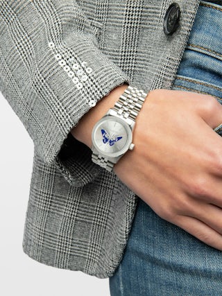 Zadig Small Watch - Stainless steel watch with silver dial featuring electric blue butterfly and steel bracelet.