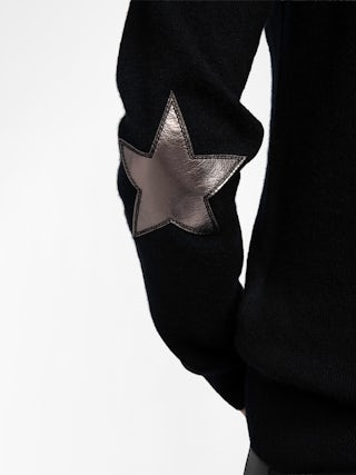 Cici Patch Cashmere Sweater - Wrap yourself in luxurious comfort with the Cici Patch Cashmere Sweater, a timeless essential with a modern twist. Made from 100% cashmere, this women’s elbow patch sweater features eye-catching silver-colored leather star patches for a unique, edgy touch. A ribbed neckline, cuffs, and waist enhance the fit, while delicate pointelle ZV signature detailing adds refined elegance. Soft, stylish, and effortlessly chic, this sweater is a must-have for any wardrobe.