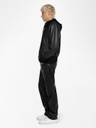 Mate Leather Jacket - Black leather and nylon reversible jacket with pockets and badge on the back.