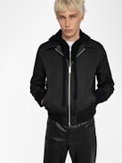 Mate Leather Jacket - Black leather and nylon reversible jacket with pockets and badge on the back.