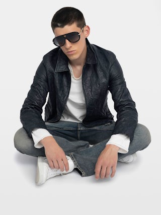 Loumy Leather Jacket - Clean crinkled leather jacket with zip closure, piped pockets and embossed wings signature on back.