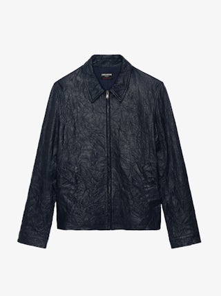 Blouson Loumy Cuir - Blouson fermeture zippée épuré en cuir froissé avec poches passepoilées et signature ailes embossées au dos.