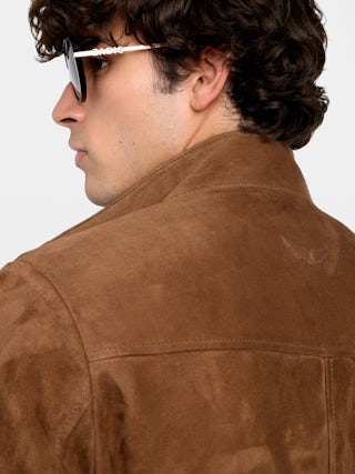 Blouson Lonni Cuir Suede - Blouson en cuir suède à col montant, fermeture boutonnée et manches longues.