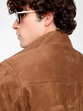 Blouson Lonni Cuir Suede - Blouson en cuir suède à col montant, fermeture boutonnée et manches longues.