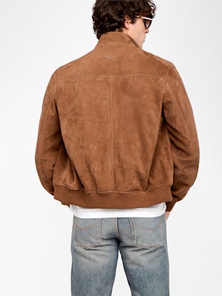 Blouson Lonni Cuir Suede - Blouson en cuir suède à col montant, fermeture boutonnée et manches longues.