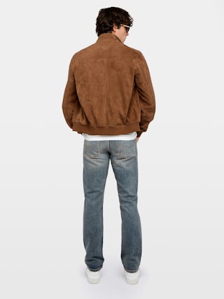Blouson Lonni Cuir Suede - Blouson en cuir suède à col montant, fermeture boutonnée et manches longues.